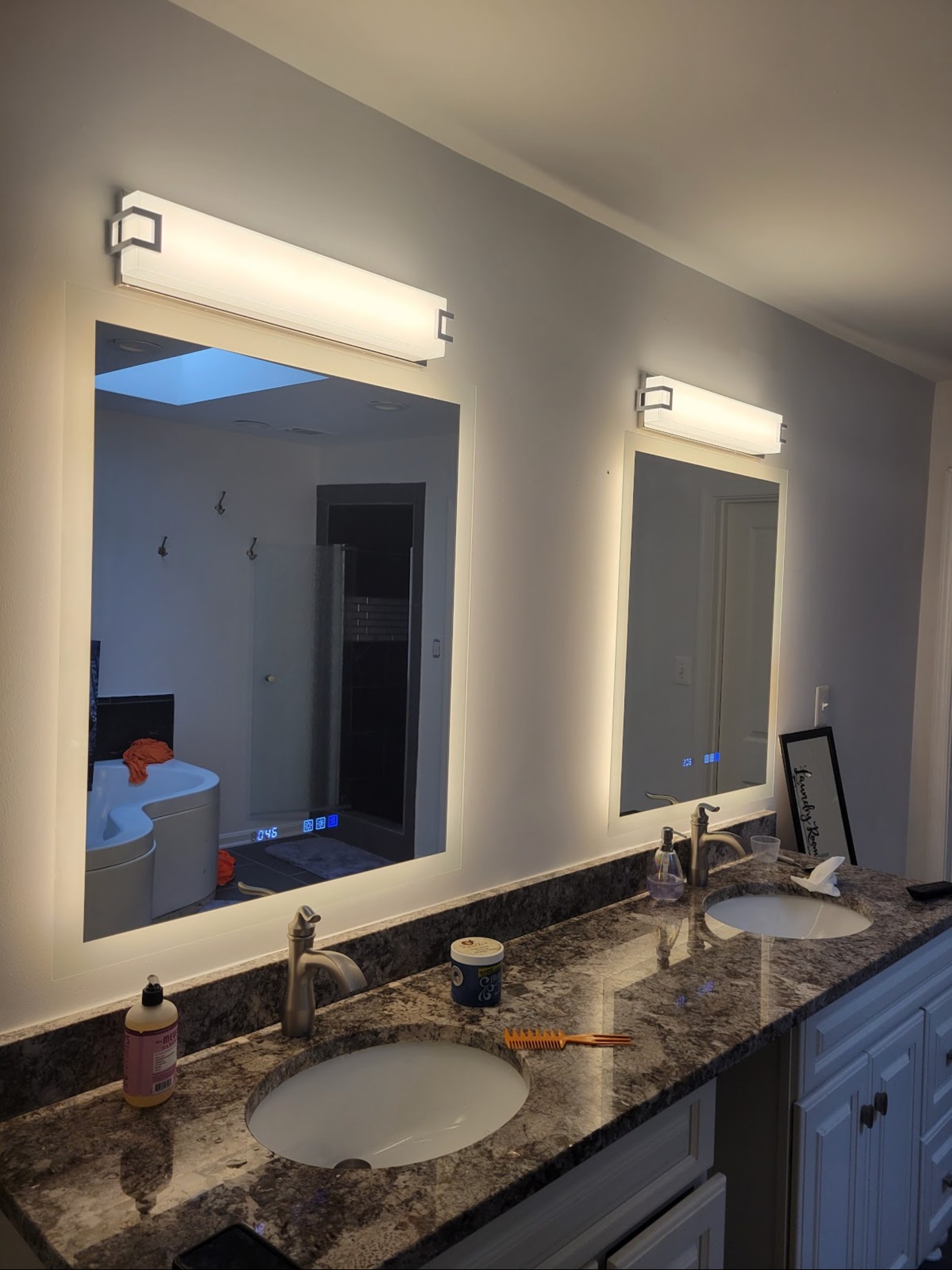 Bathroom vanity with illuminated LED mirrors in Washington, DC — Schmidt's Electrical