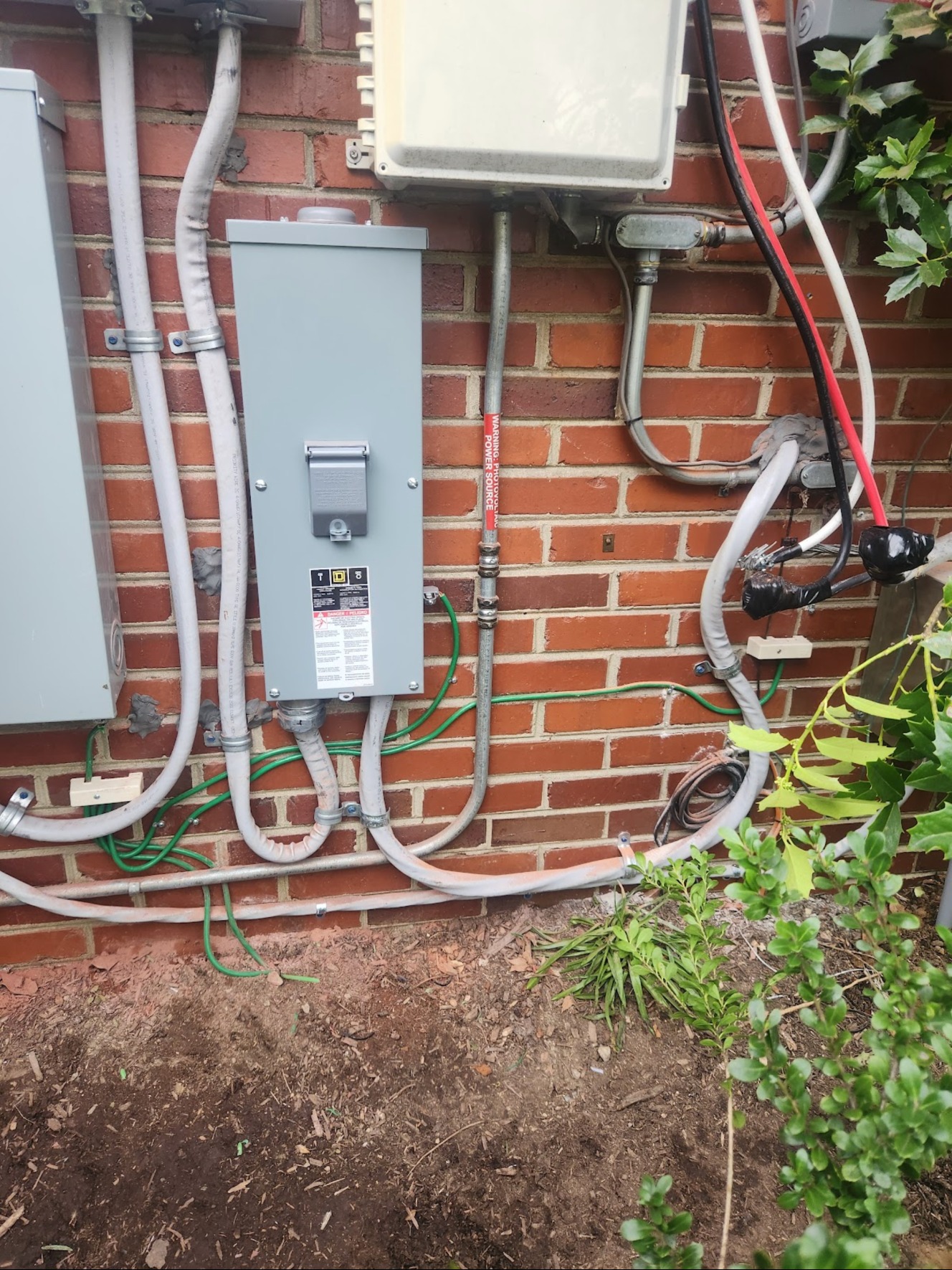 Exterior solar PV disconnect and conduit in Washington, DC — Schmidt's Electrical
